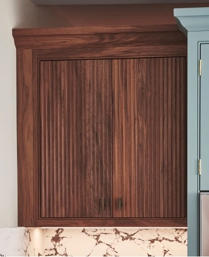 Fluted walnut wall cabinet