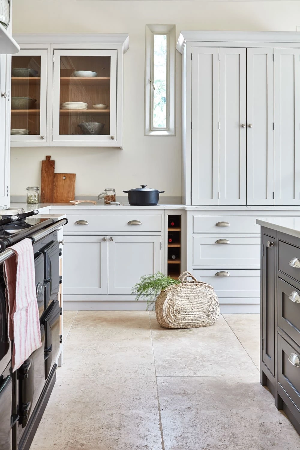 This spacious shaker kitchen is perfect for those who love to cook and entertain guests. The sleek shaker cabinetry provides ample storage.