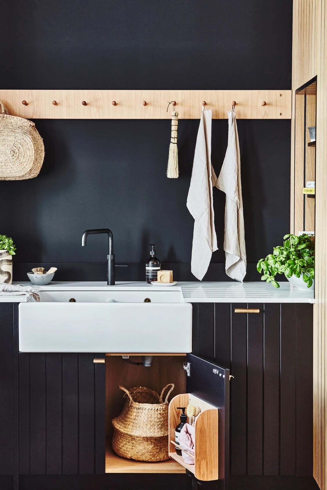 Close-up of the Kitchen's oak shaker peg rails, adding a functional and decorative element to the space, perfect for hanging utensils or towels.