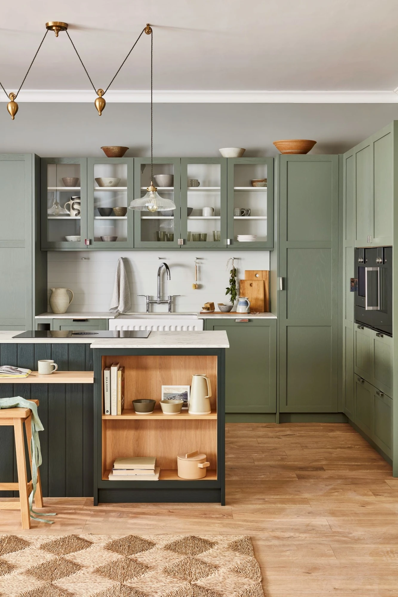 A detailed shot of the kitchen's Gaggenau appliances, illuminating the epitome of luxury and performance. The appliances boast sleek designs and advanced technology, further enhancing the kitchen's modern aesthetic. 