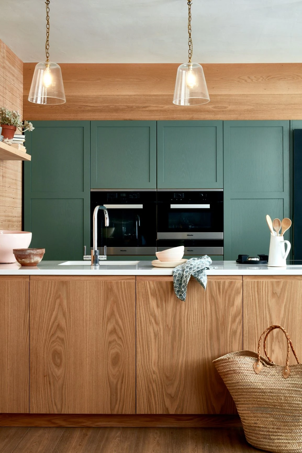 A detailed view of the Stamford kitchen's sleek cabinets, showcasing the subtle grain of the oak wood and the smooth finish. The generous storage space is evident in this image.