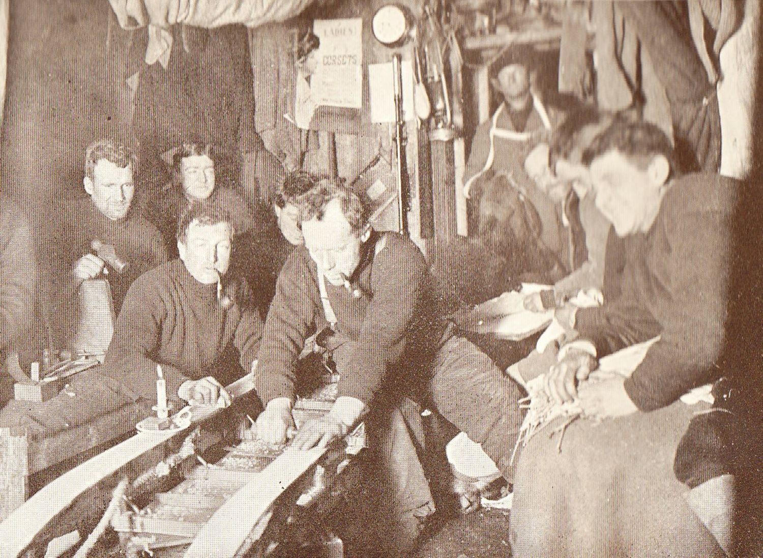 Ernest Shackleton's crew working on a sledge within the Cape Royds hut,